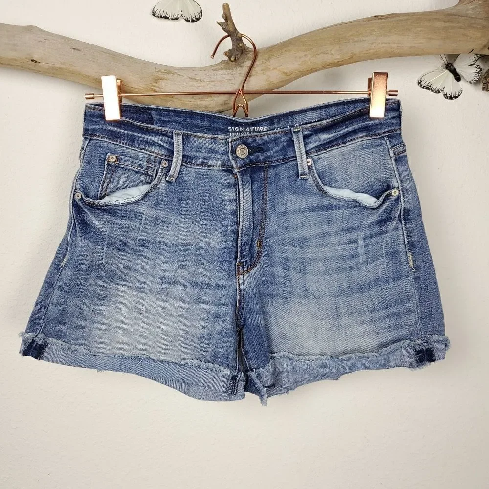Levi's high rise distressed denim shorts